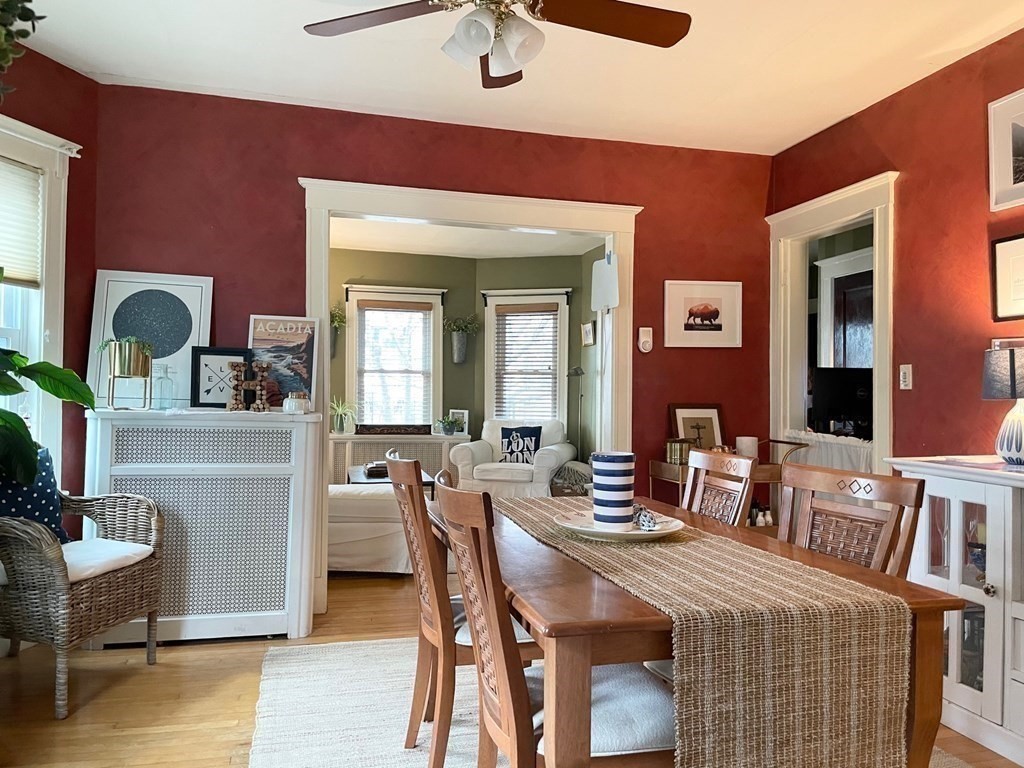 51 Presentation Road, Unit 1 Boston, MA 02135 - Photo 6 of 15 a view of a dining room with furniture