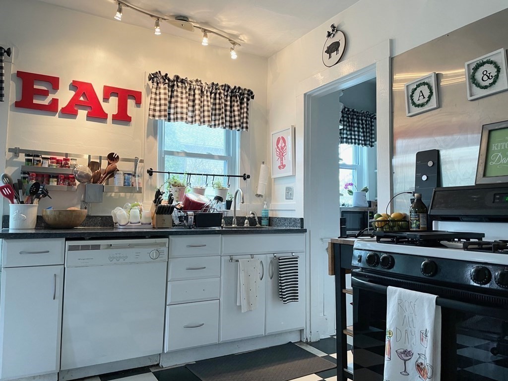 51 Presentation Road, Unit 1 Boston, MA 02135 - Photo 10 of 15 a kitchen with lots of counter top space