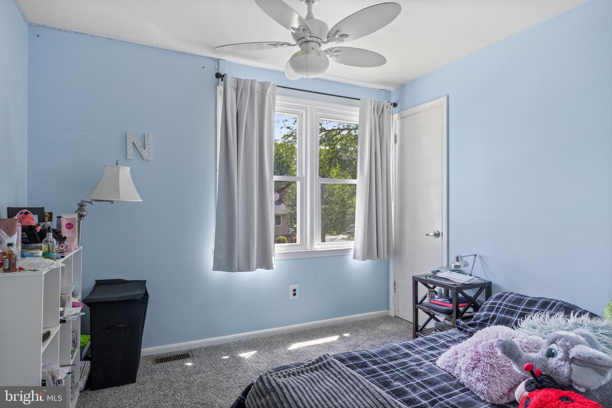 153 Oxford Road Delran, NJ 08075 - Photo 13 of 24 a bedroom with a bed and wooden floor