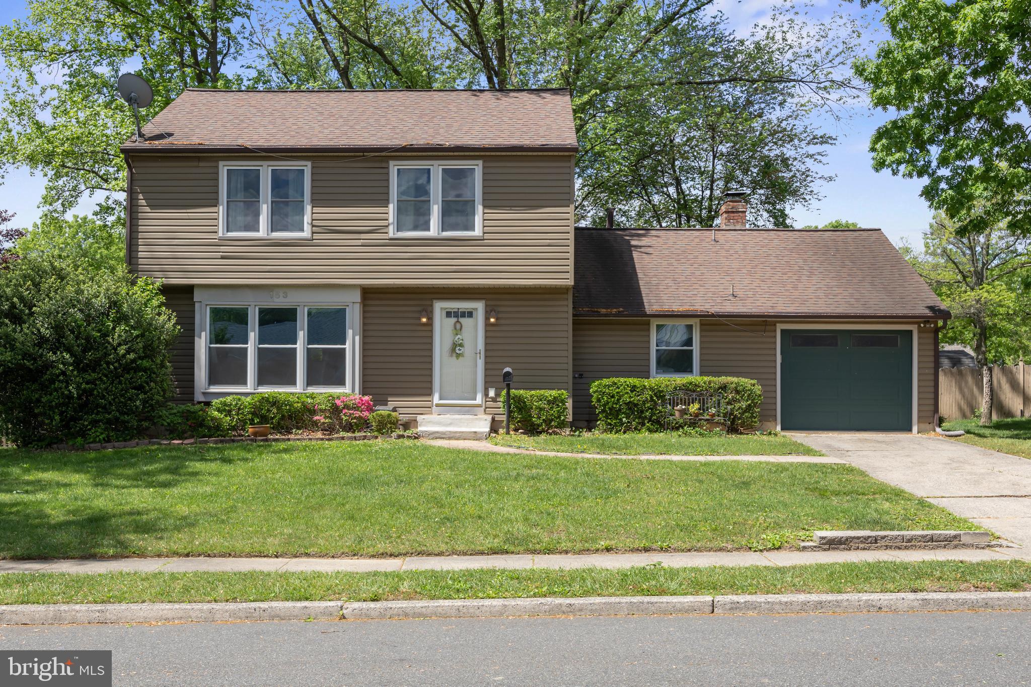 153 Oxford Road Delran, NJ 08075 - Photo 24 of 24 a front view of a house with a yard