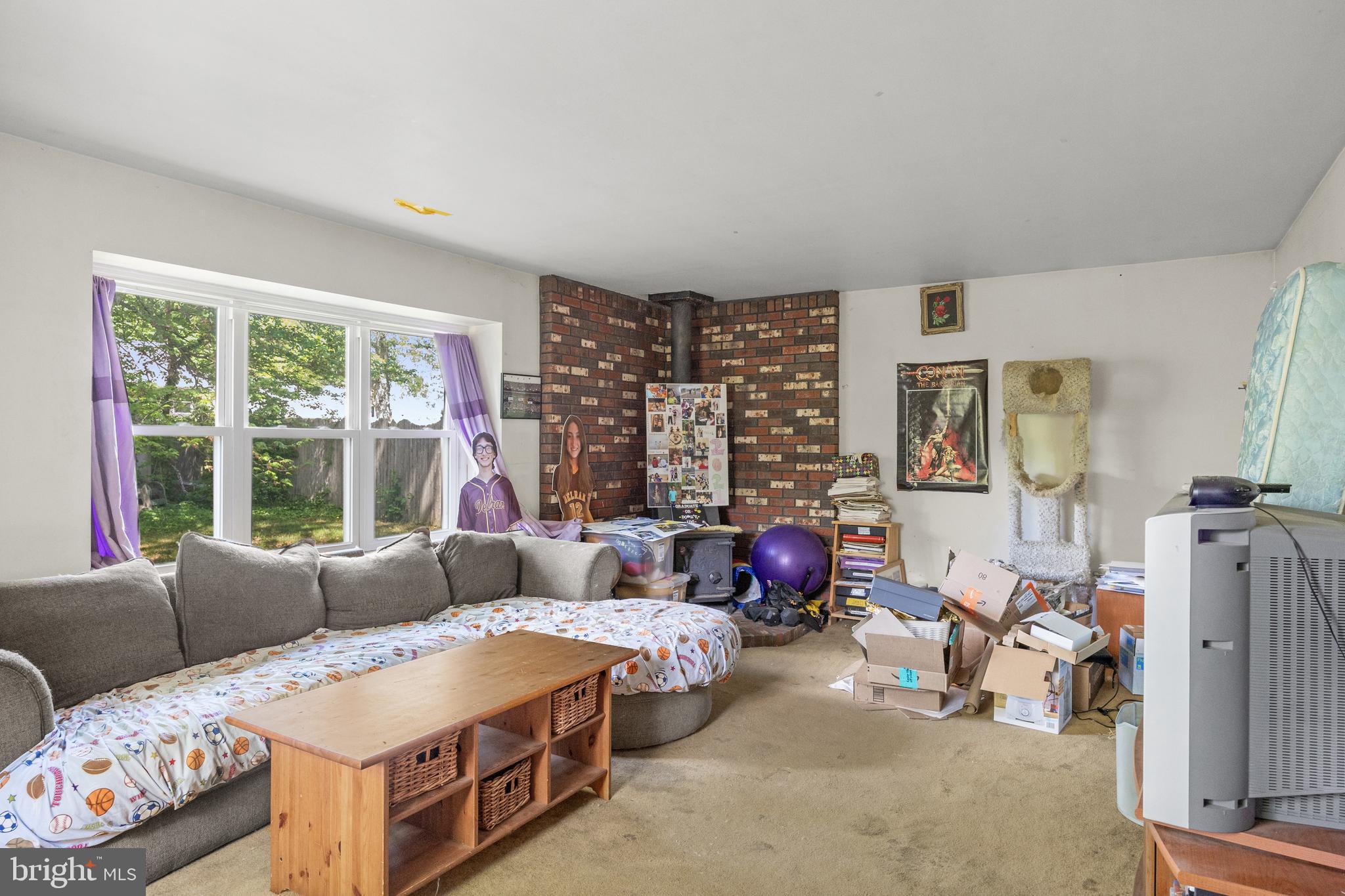 153 Oxford Road Delran, NJ 08075 - Photo 9 of 24 a living room with furniture and a large window