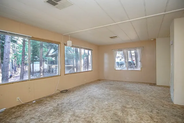 an empty room with windows