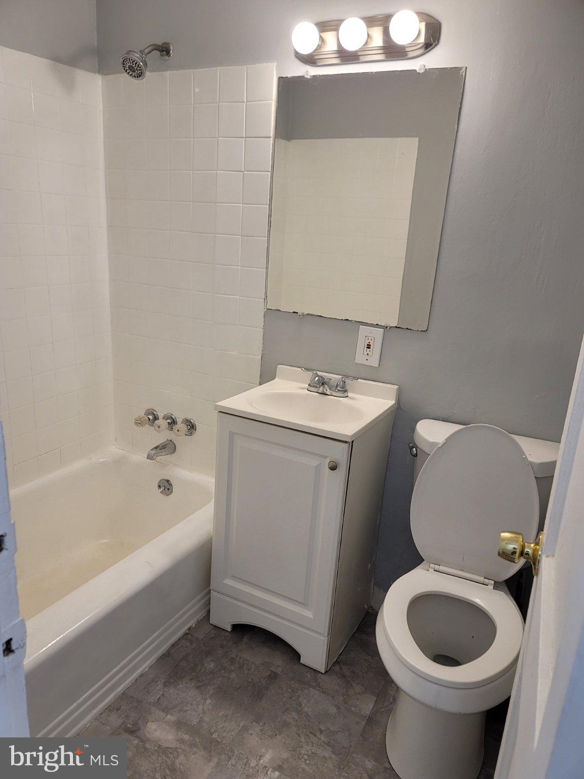 5037 Benning Road Southeast Washington, DC 20019 - Photo 6 of 13 Cozy bathroom with modern fixtures.