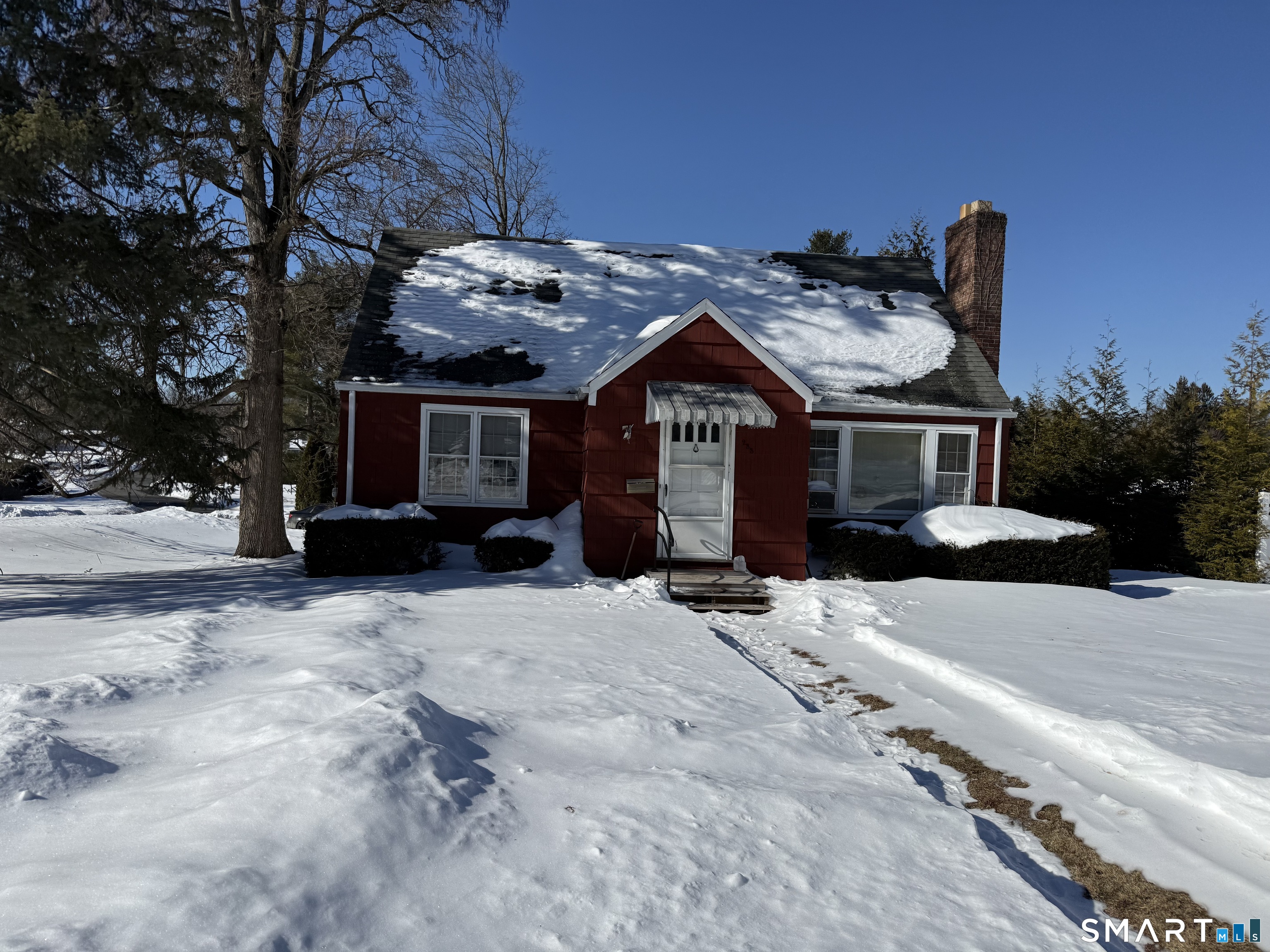 233 Church Street Newington, CT 06111 - Photo 2 of 18 a front view of a house with a yard