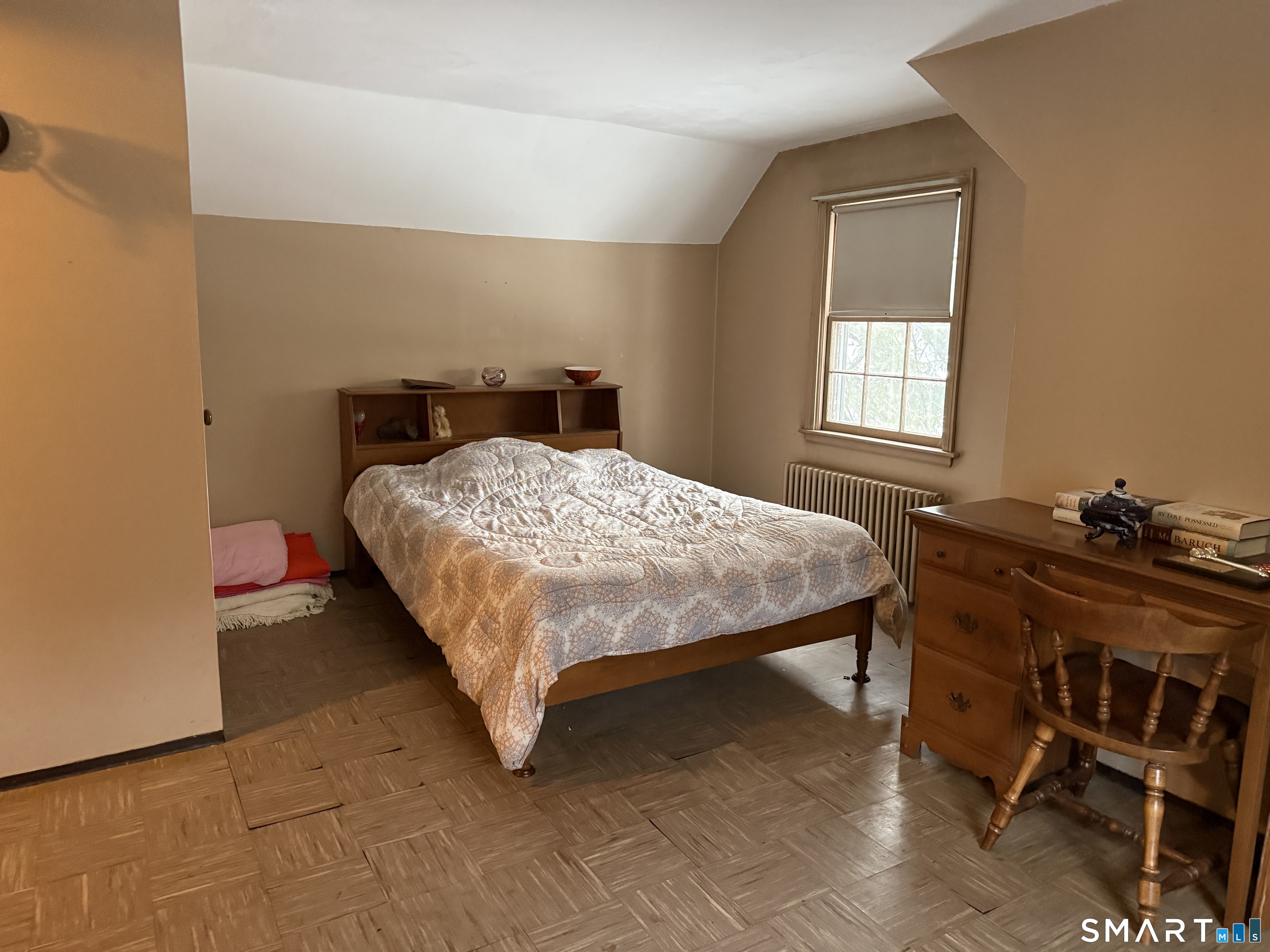 233 Church Street Newington, CT 06111 - Photo 10 of 18 a bedroom with a bed and a window