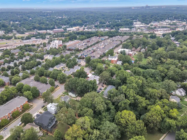 an aerial view of a city with lots of residential buildings