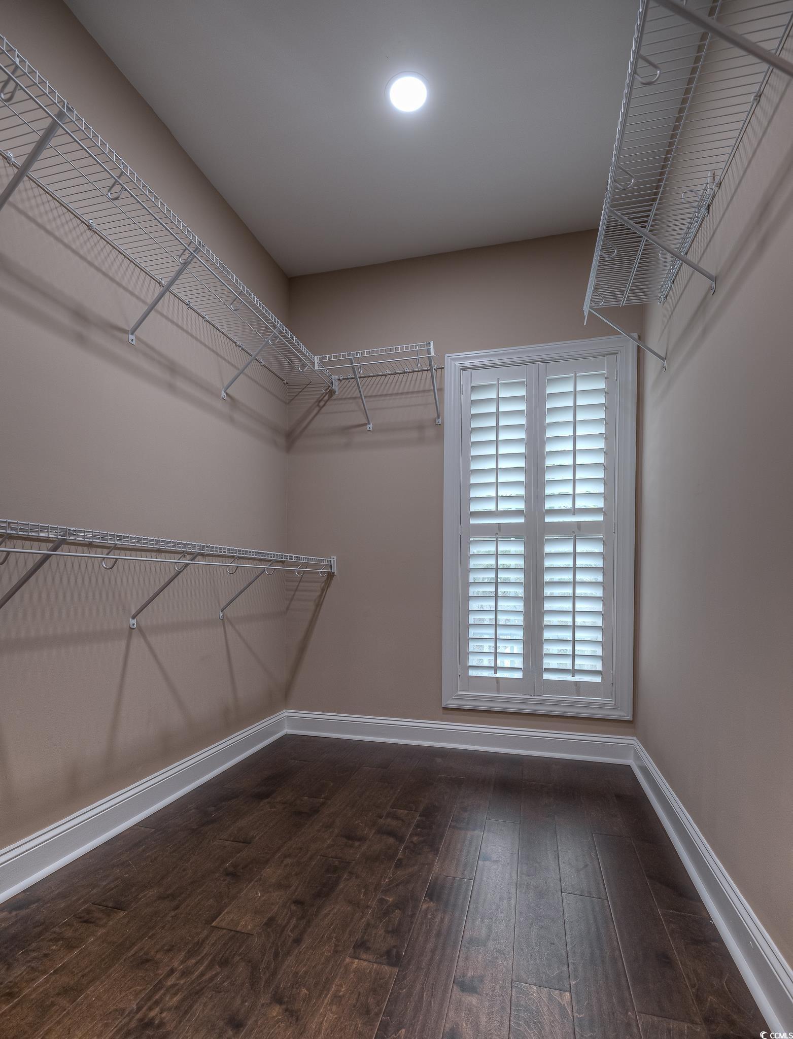 103 Charles Towne Lane Murrells Inlet, SC 29576 - Photo 14 of 23 Spacious closet with wood finished floors