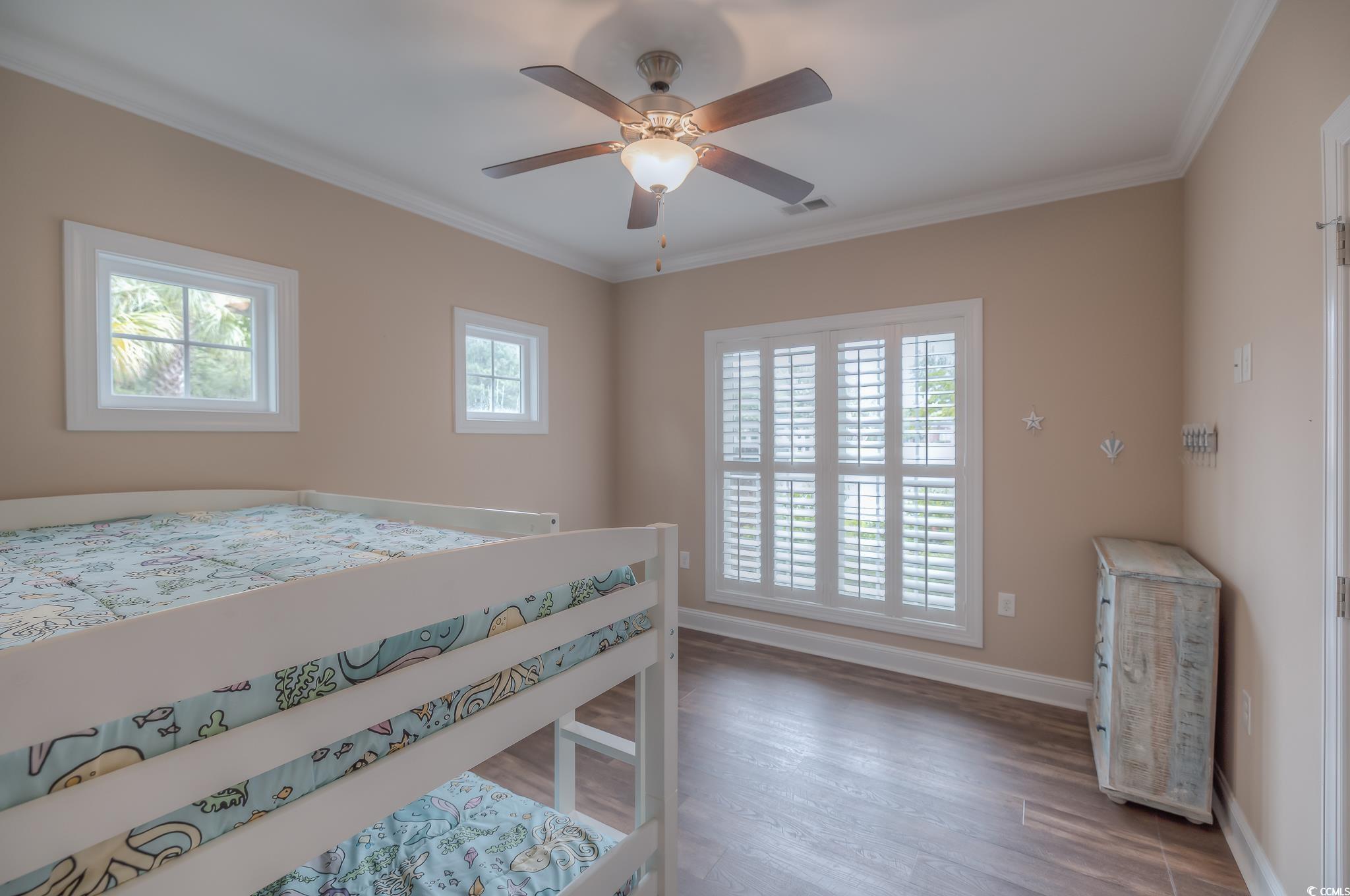 103 Charles Towne Lane Murrells Inlet, SC 29576 - Photo 20 of 23 Bedroom with wood finished floors, ornamental molding, and ceiling fan