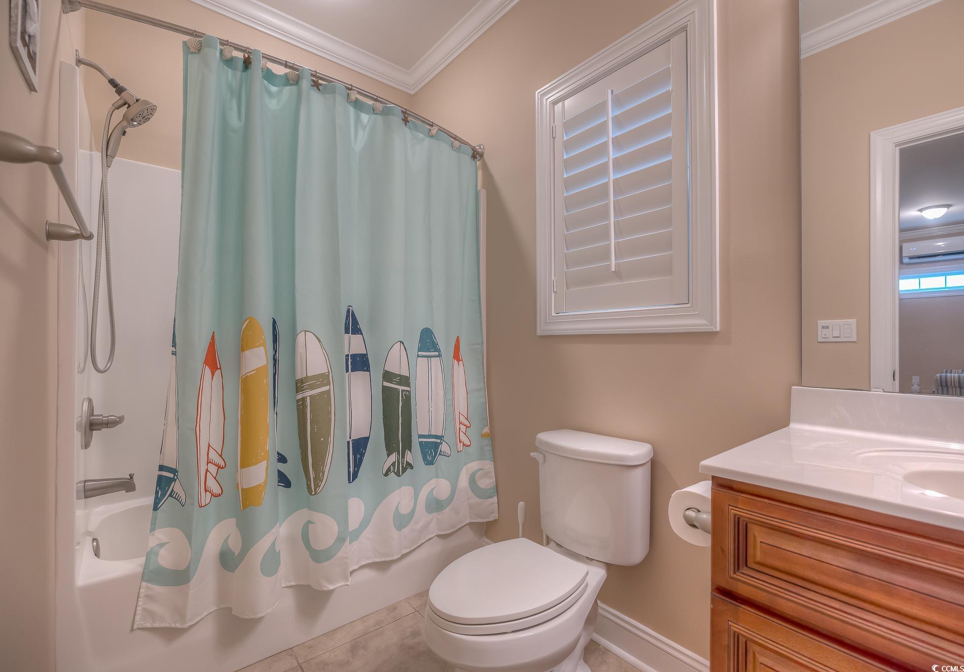 103 Charles Towne Lane Murrells Inlet, SC 29576 - Photo 22 of 23 Full bath featuring crown molding, vanity, shower / bath combo, and tile patterned floors