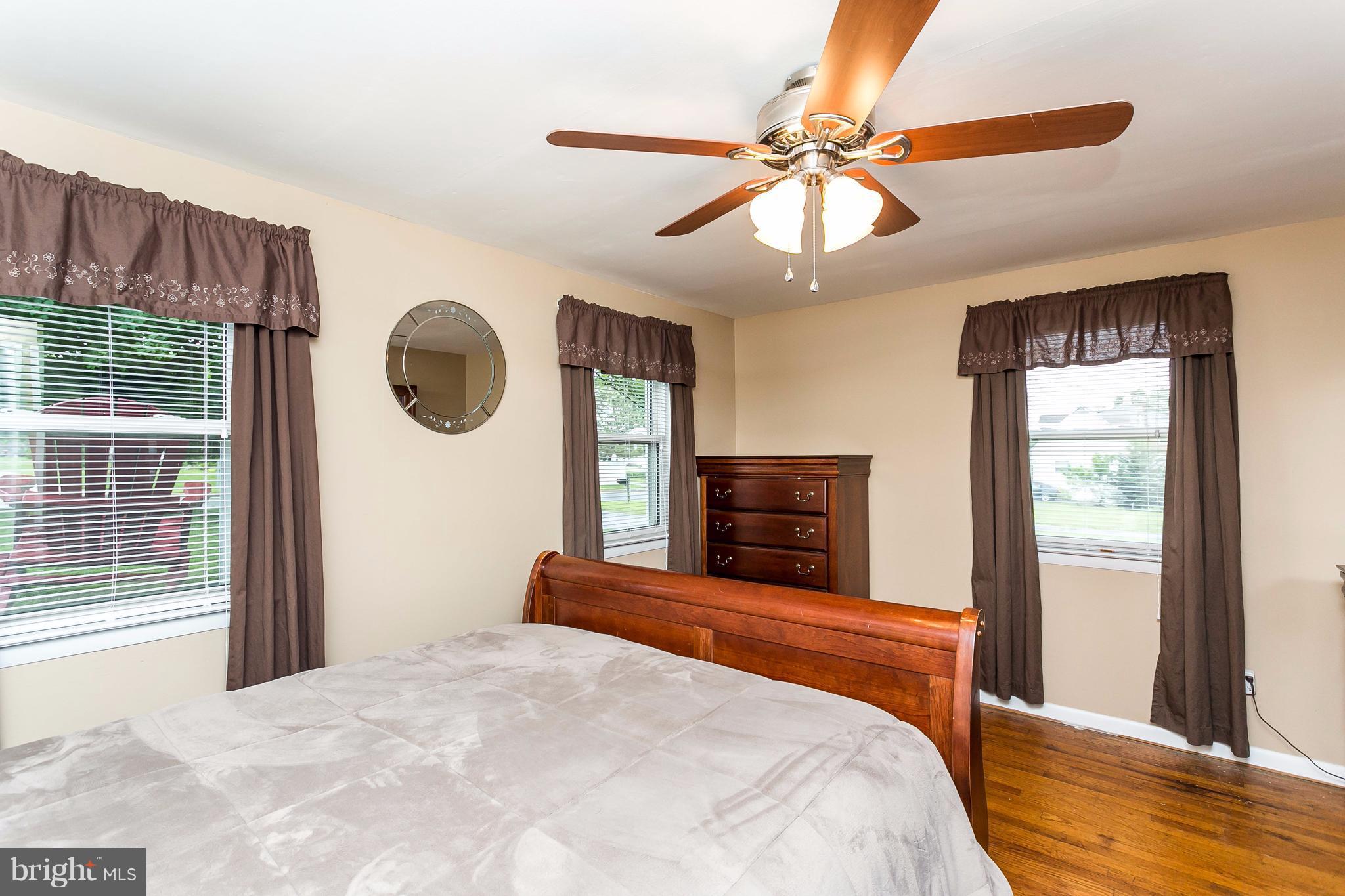 9216 Avondale Road Baltimore, MD 21234 - Photo 13 of 30 Master bedroom with wood floors