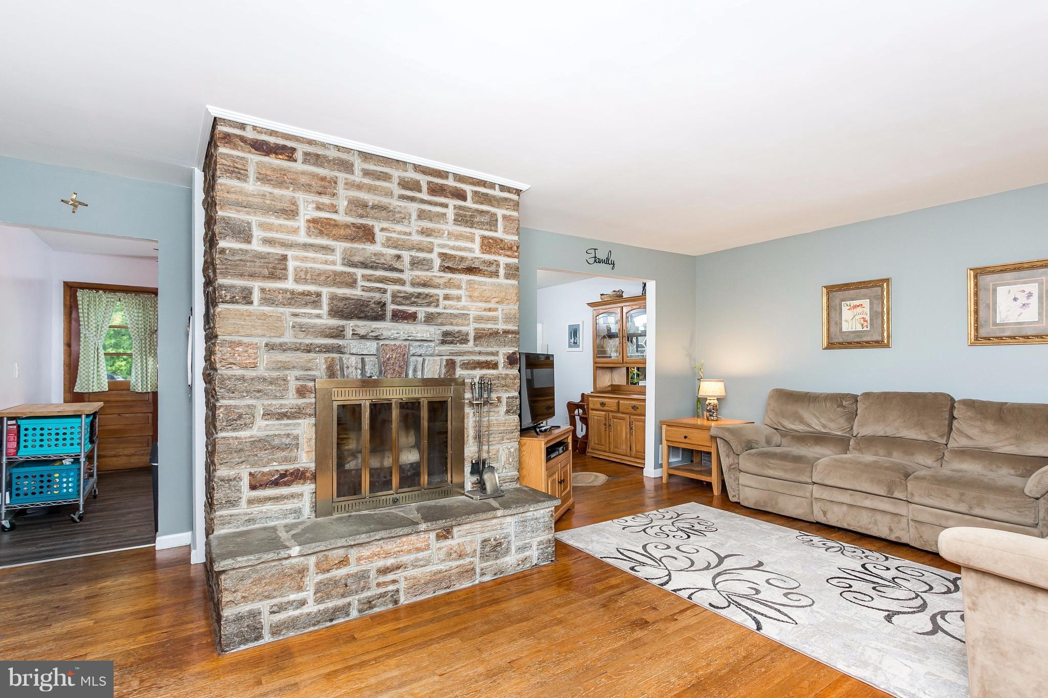 9216 Avondale Road Baltimore, MD 21234 - Photo 3 of 30 Stone fireplace with heatilator