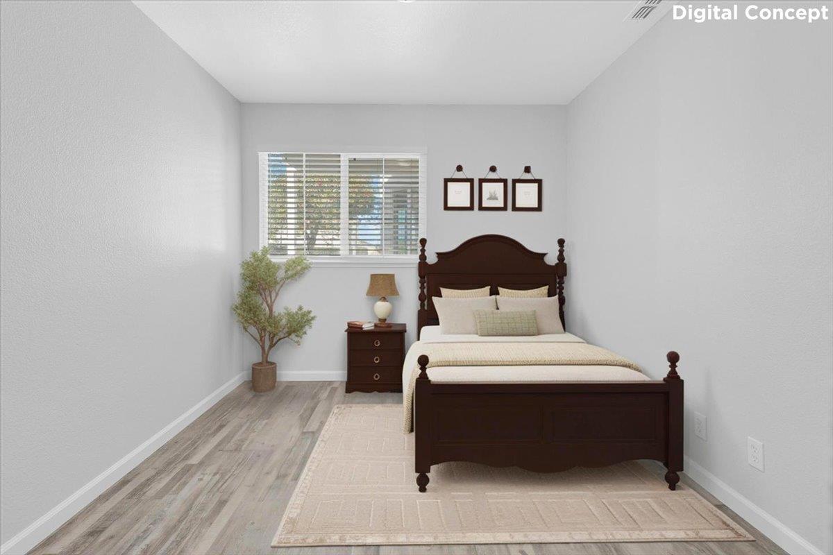 159 Dolphin Circle Marina, CA 93933 - Photo 11 of 31 a bedroom with a bed and a large window