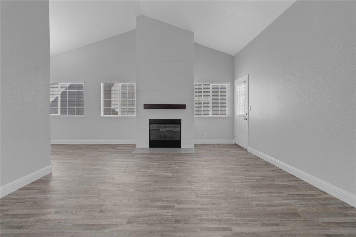 159 Dolphin Circle Marina, CA 93933 - Photo 19 of 31 a view of an empty room with a fireplace and a window