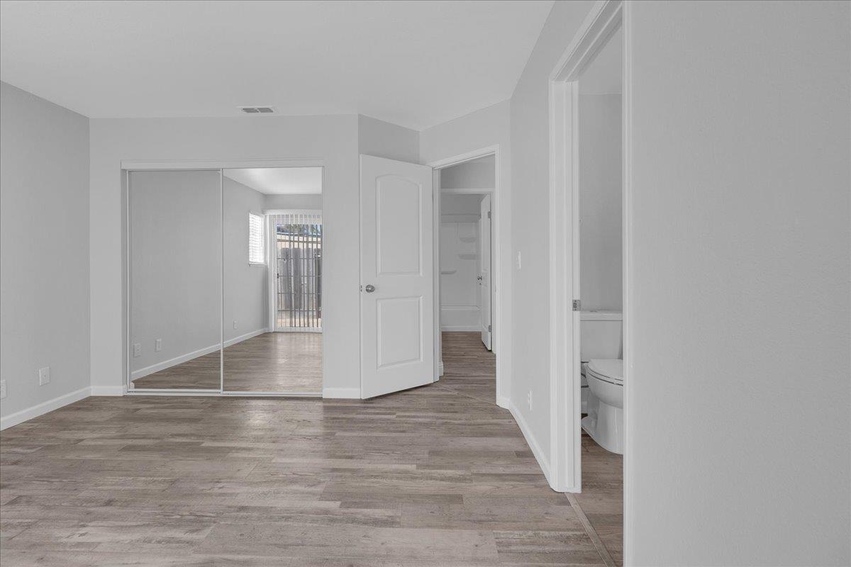 159 Dolphin Circle Marina, CA 93933 - Photo 24 of 31 a view of a hallway with wooden floor