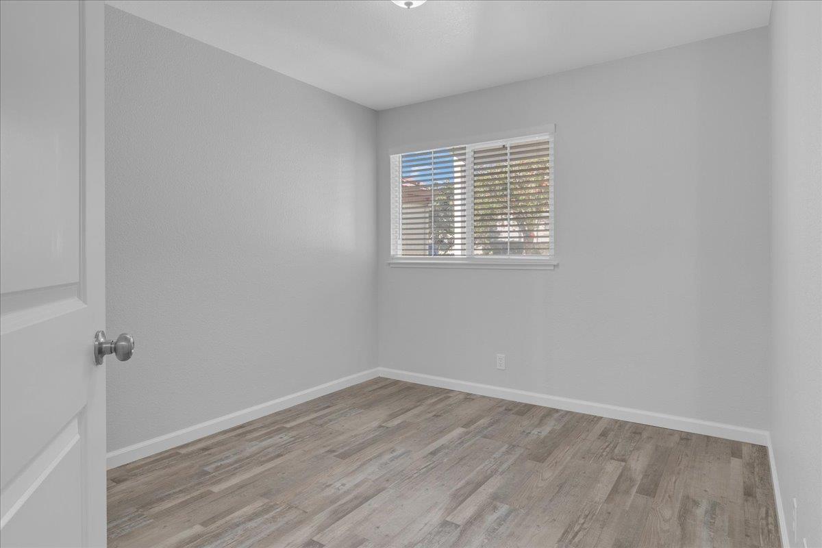 159 Dolphin Circle Marina, CA 93933 - Photo 26 of 31 wooden floor in an empty room with a window