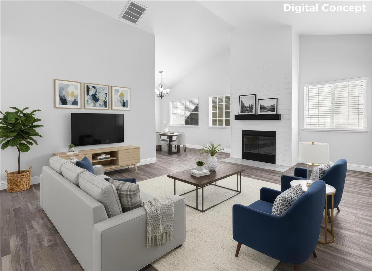 159 Dolphin Circle Marina, CA 93933 - Photo 5 of 31 a living room with furniture a flat screen tv and a fireplace