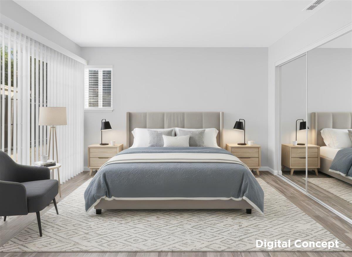 159 Dolphin Circle Marina, CA 93933 - Photo 10 of 31 a spacious bedroom with a bed a couch and windows