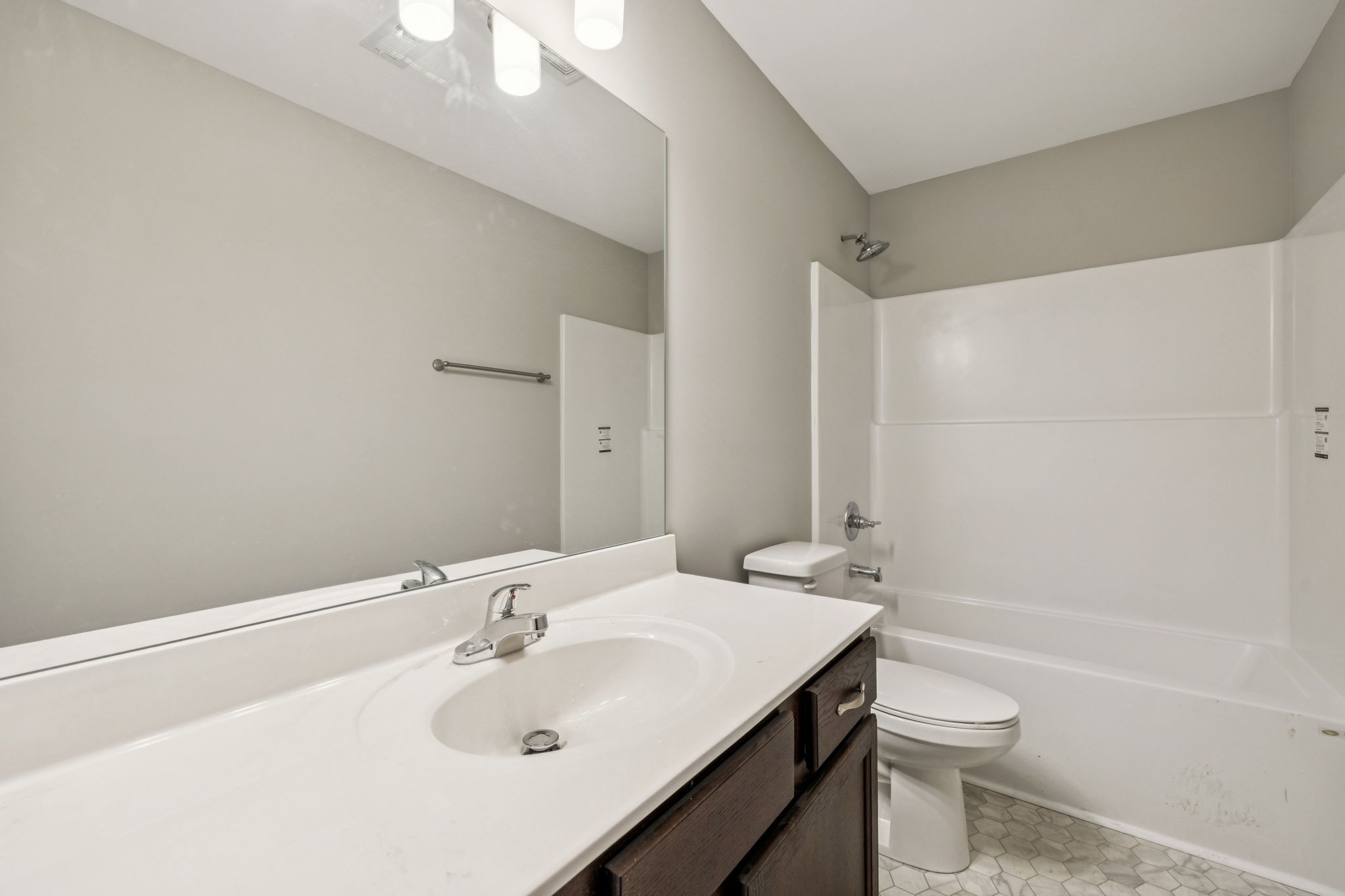 146 Old Brick Church Road Estill Springs, TN 37330 - Photo 25 of 44 a bathroom with a sink a toilet and shower
