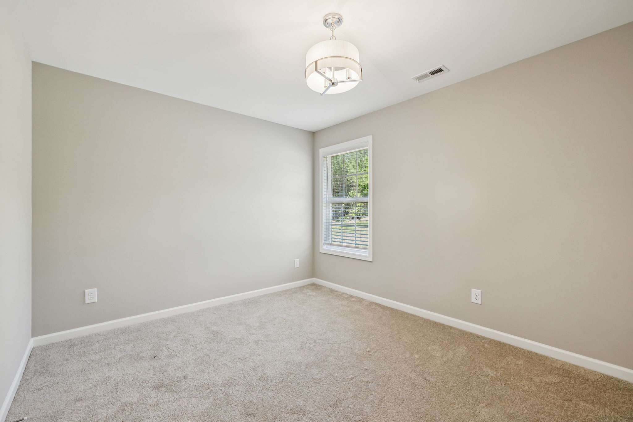 146 Old Brick Church Road Estill Springs, TN 37330 - Photo 26 of 44 an empty room with a window