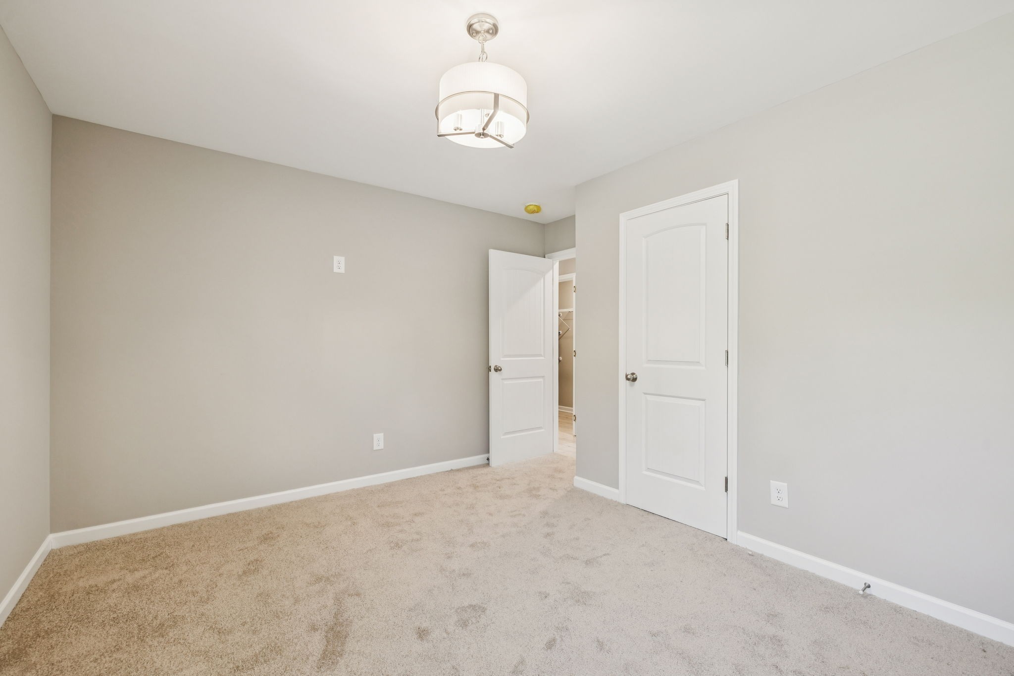 146 Old Brick Church Road Estill Springs, TN 37330 - Photo 28 of 44 a view of an empty room and chandelier fan