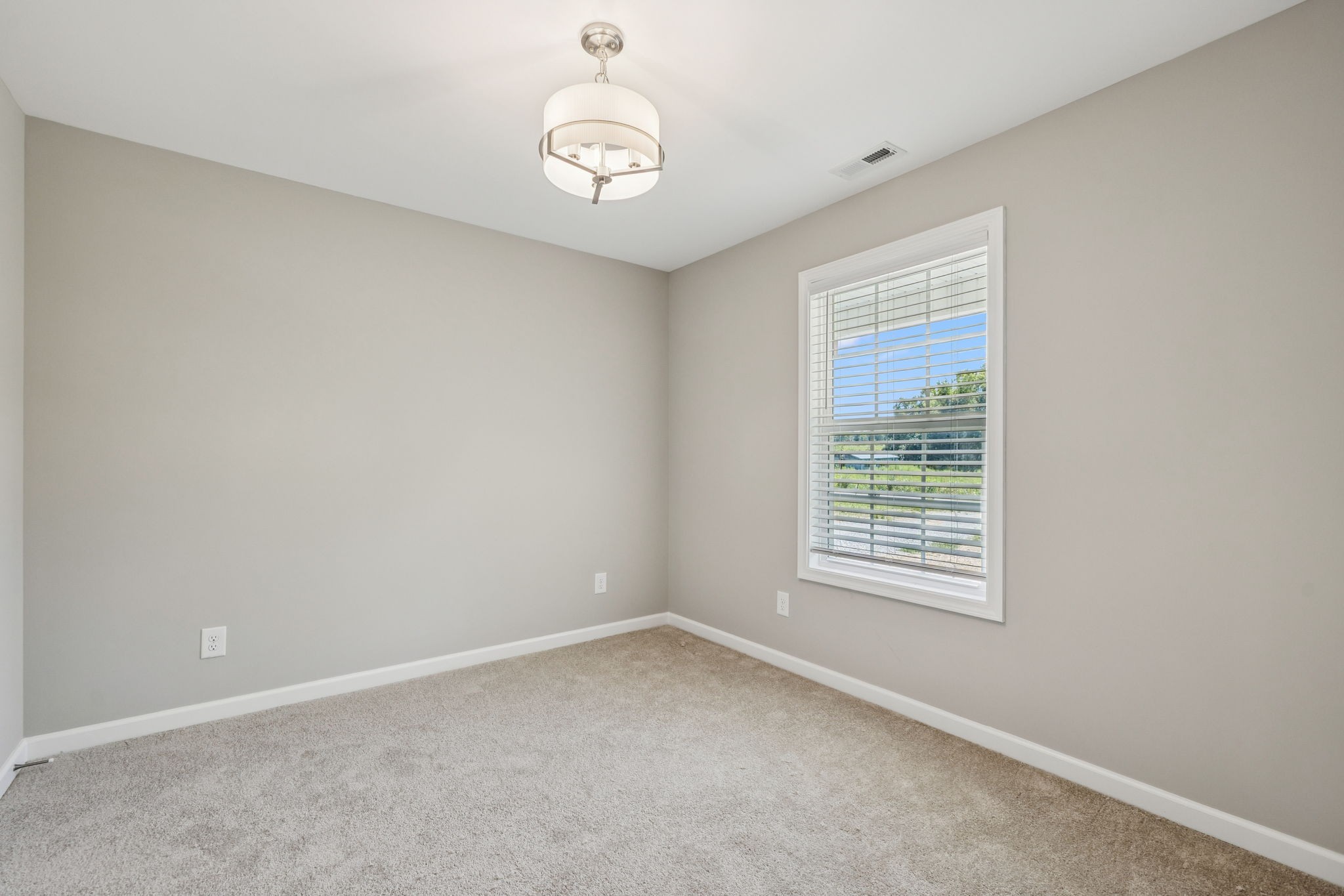 146 Old Brick Church Road Estill Springs, TN 37330 - Photo 29 of 44 an empty room with a window
