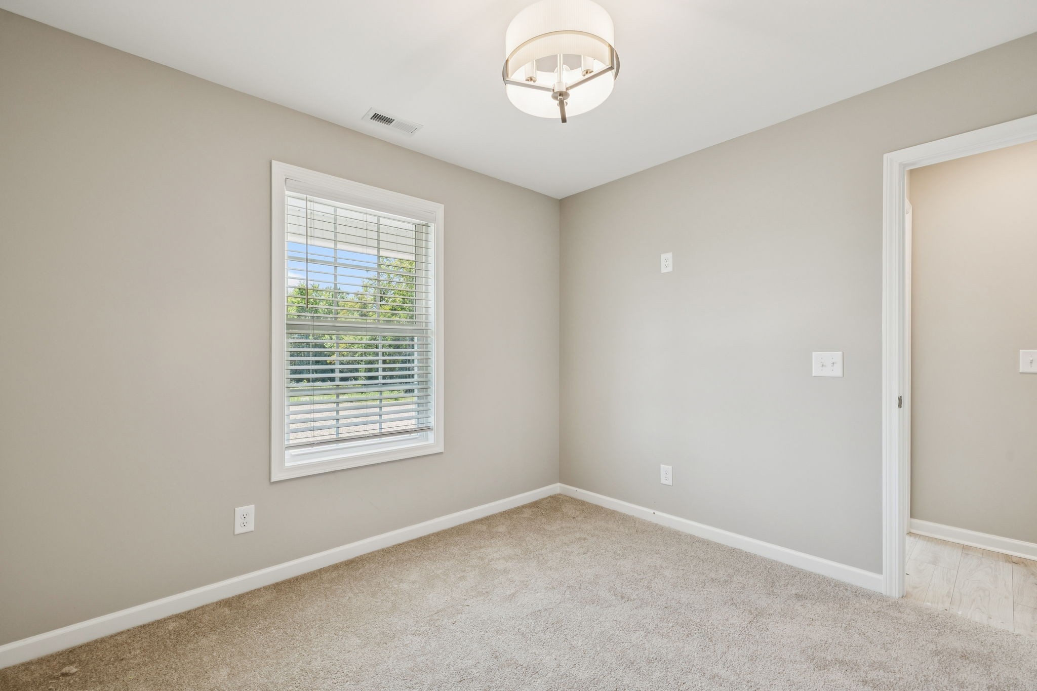 146 Old Brick Church Road Estill Springs, TN 37330 - Photo 31 of 44 an empty room with a window