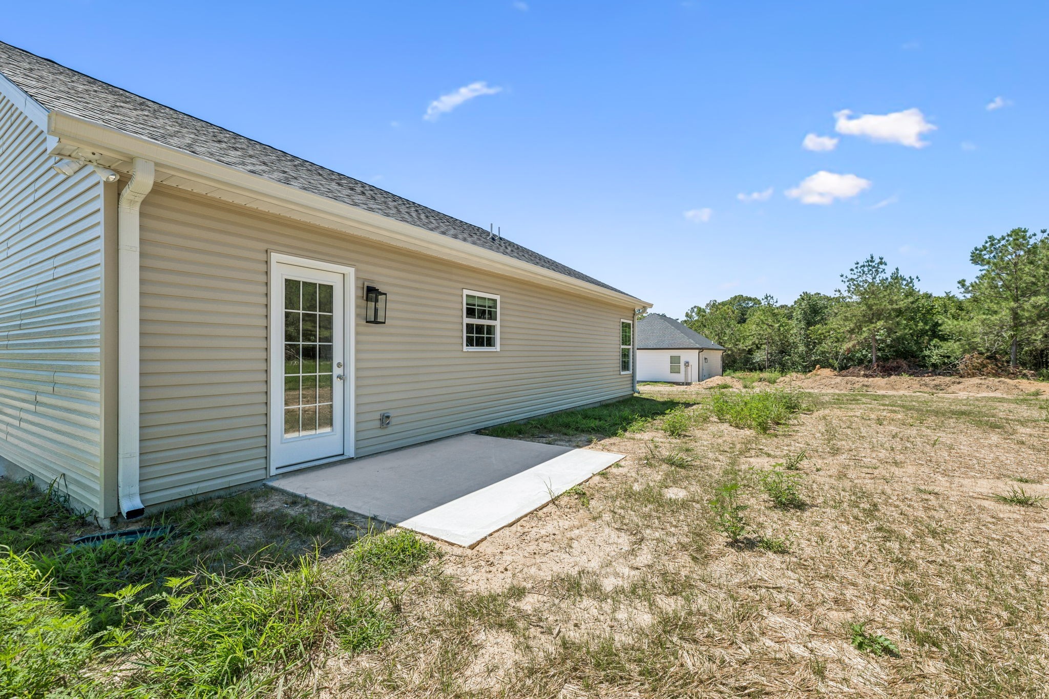146 Old Brick Church Road Estill Springs, TN 37330 - Photo 39 of 44 a backyard of a house with large trees