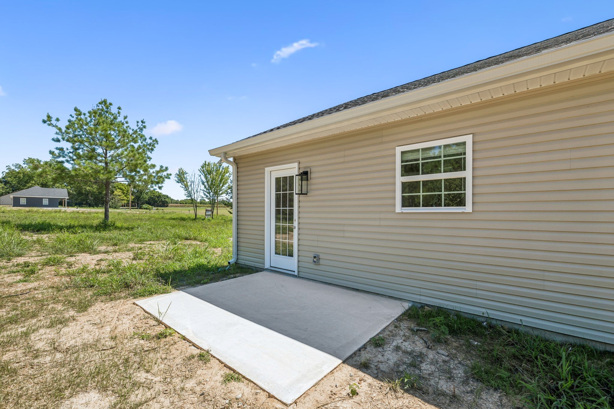 146 Old Brick Church Road Estill Springs, TN 37330 - Photo 41 of 44 a view of a backyard with plants and large tree