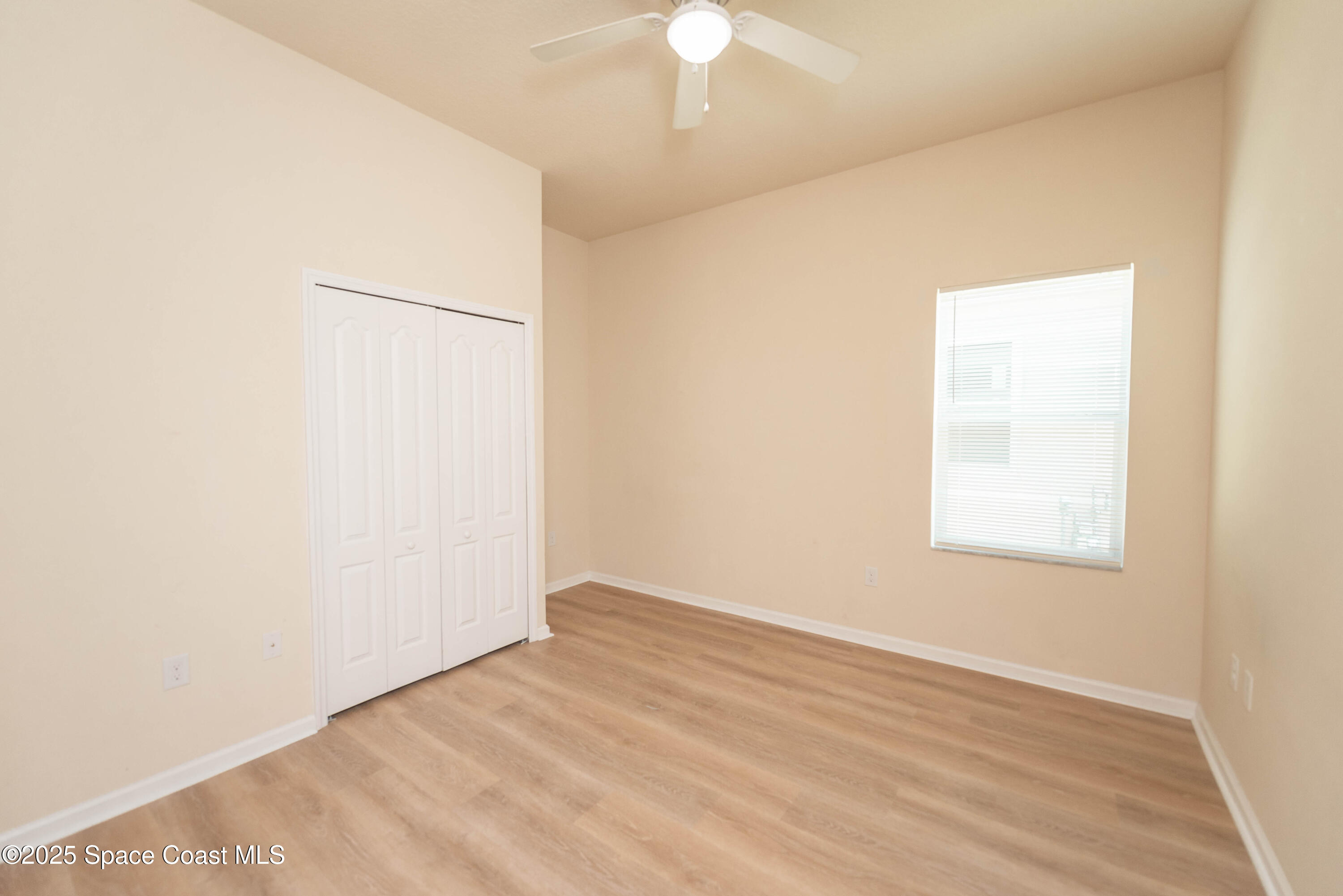 3136 Constellation Drive Melbourne, FL 32940 - Photo 21 of 28 an empty room with a window