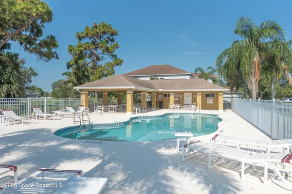 a front view of a house with swimming pool