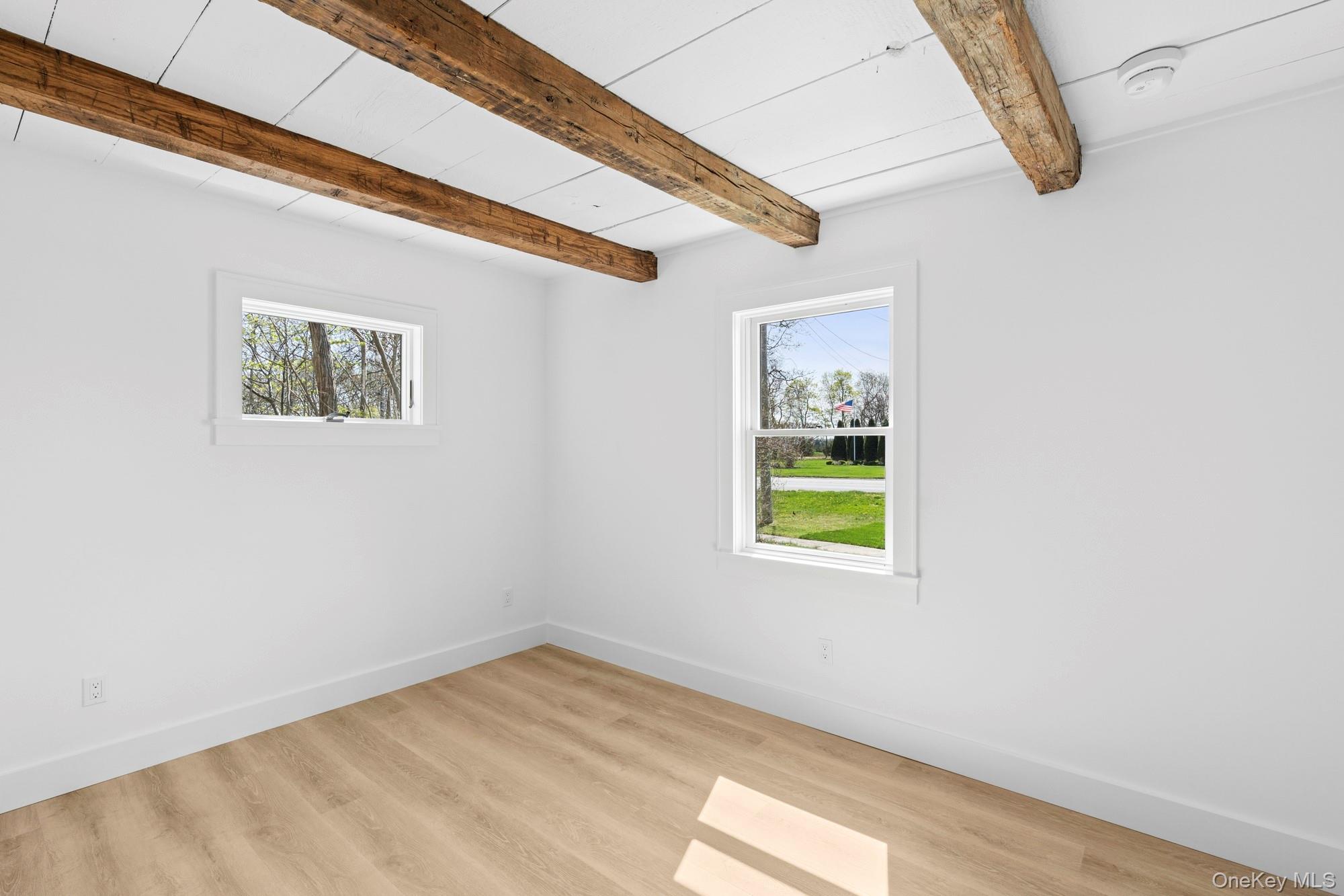 5075 Main Road Laurel, NY 11948 - Photo 11 of 22 a view of empty room with window