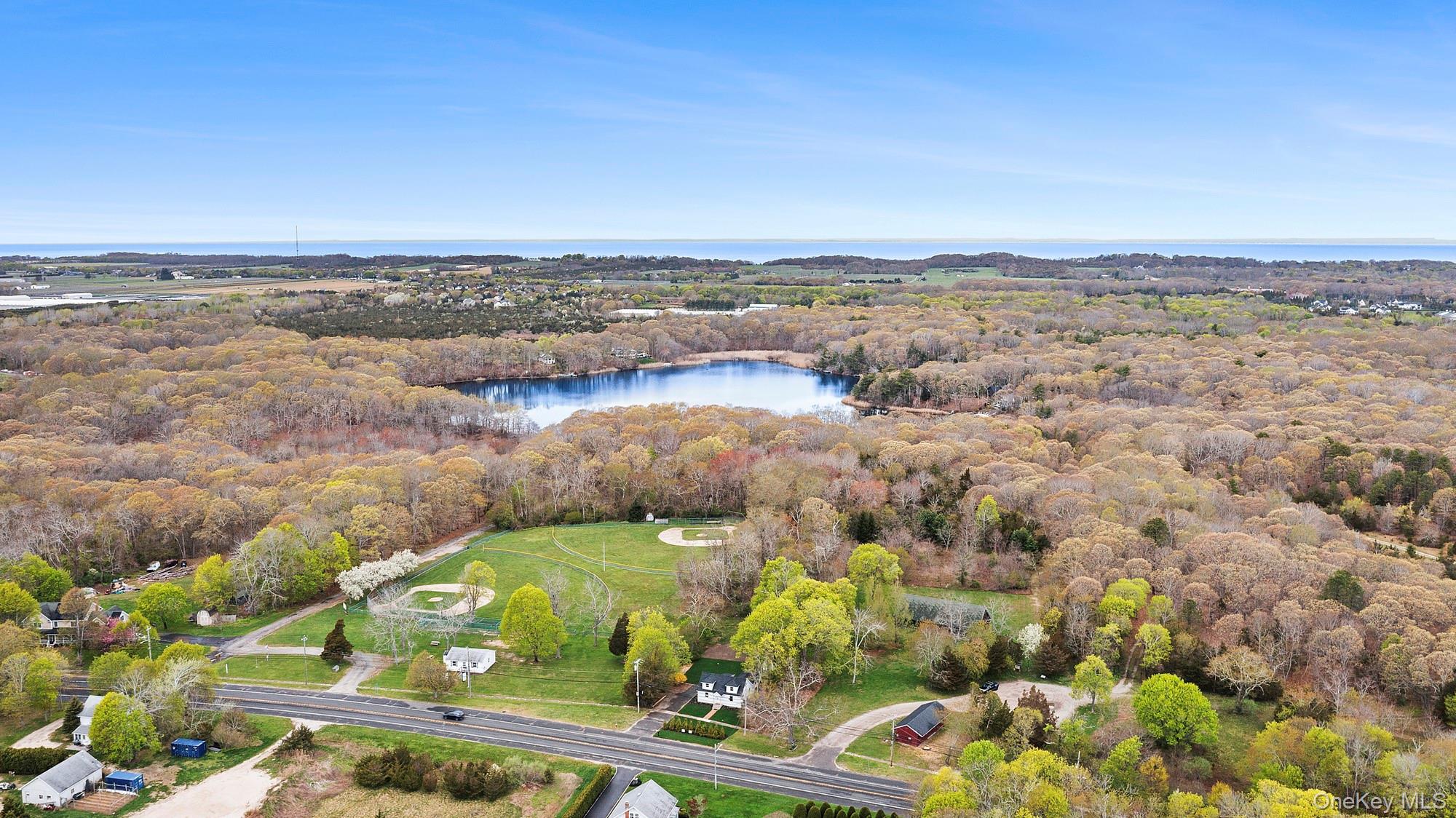 5075 Main Road Laurel, NY 11948 - Photo 19 of 22 an aerial view of beach and city
