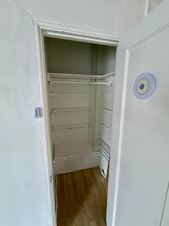 a bathroom with a glass door