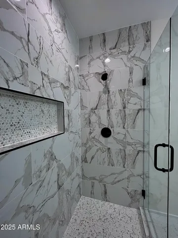 a room with a closet and wooden floor