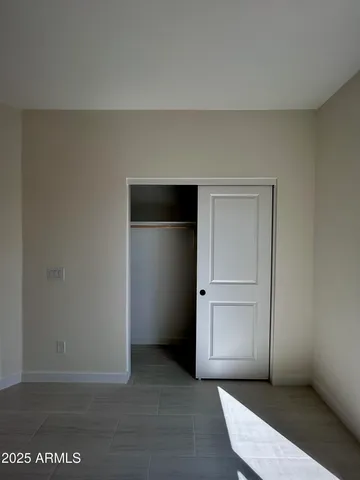 a kitchen with a sink a stove and cabinets
