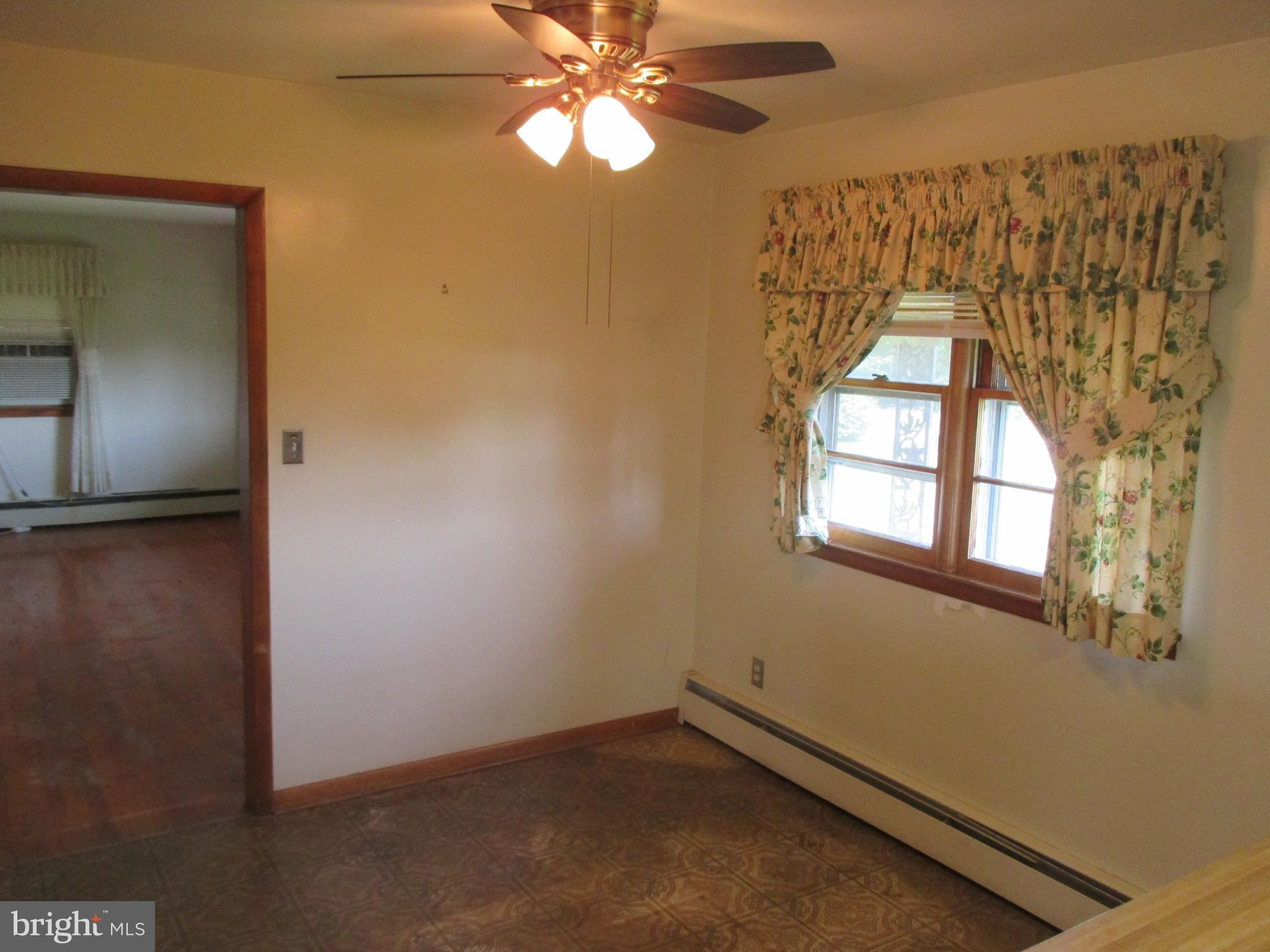 230 West Bay Front Road Lothian, MD 20711 - Photo 16 of 30 an empty room with windows and fan