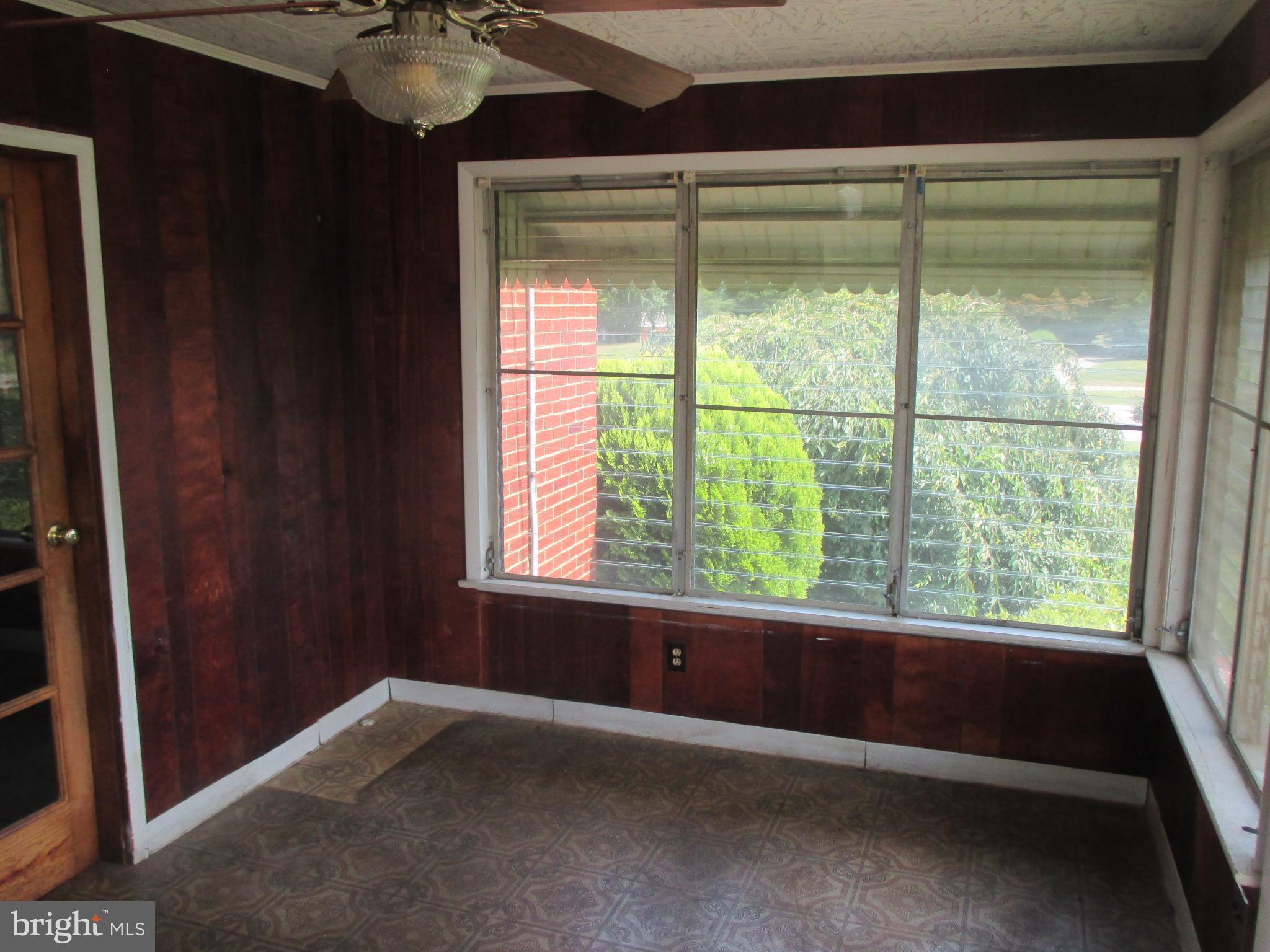 230 West Bay Front Road Lothian, MD 20711 - Photo 17 of 30 a room with a window and a ceiling fan