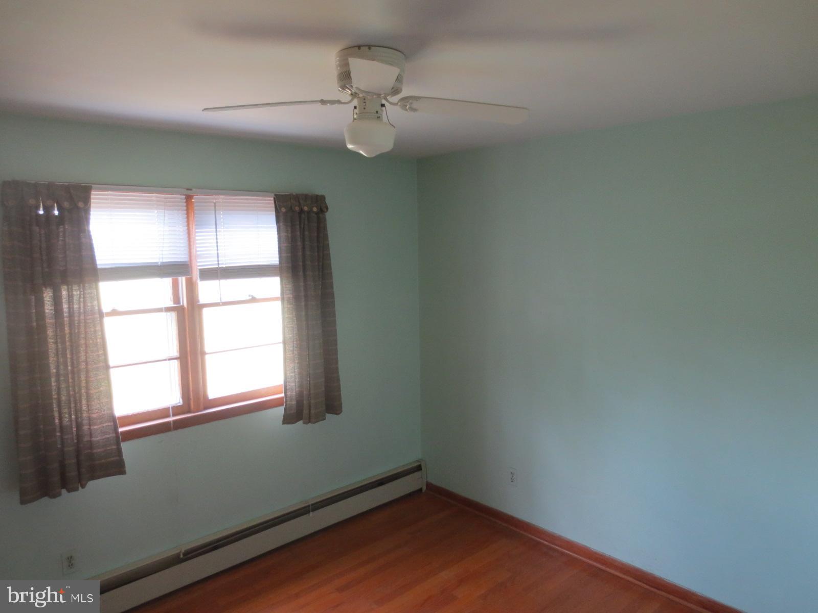 230 West Bay Front Road Lothian, MD 20711 - Photo 24 of 30 an empty room with wooden floor and windows