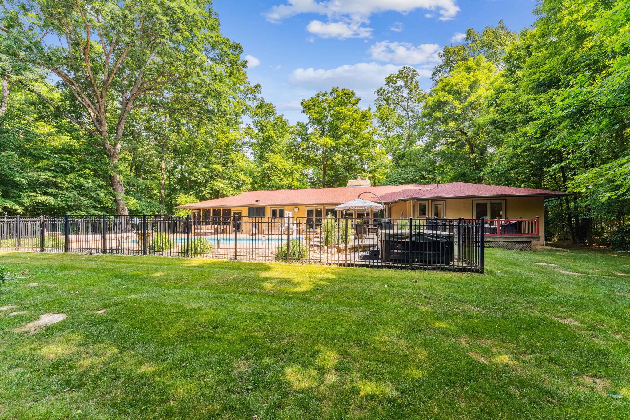 2423 Carriage Road Powell, OH 43065 - Photo 4 of 100 Outdoor entertaining at it's best with an inground pool, hot tub, walking/biking paths and fire pit!