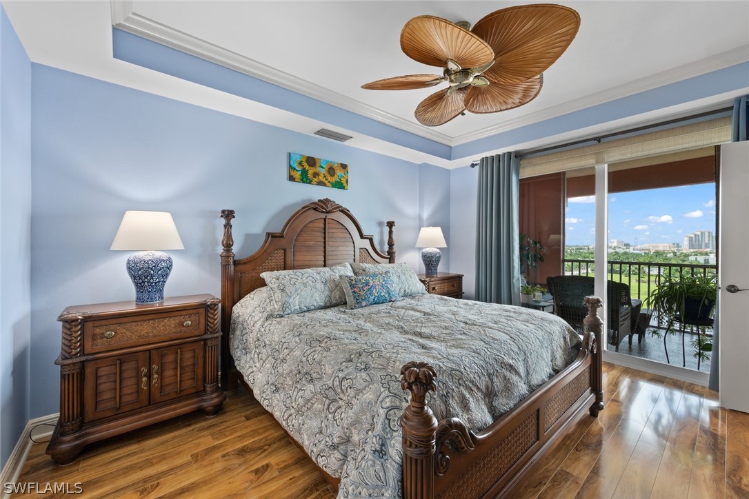 2743 First Street, Unit 1101 Fort Myers, FL 33916 - Photo 21 of 49 a bedroom with a bed and large windows