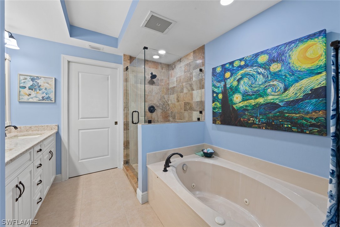 2743 First Street, Unit 1101 Fort Myers, FL 33916 - Photo 22 of 49 a bathroom with a bathtub and a shower