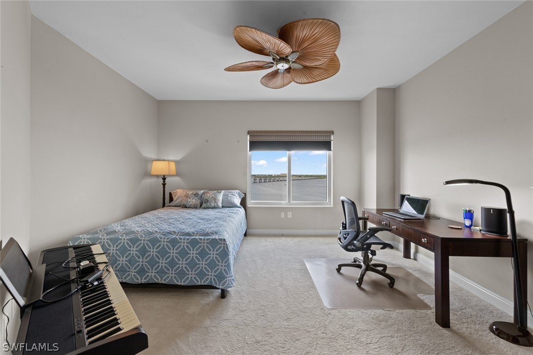 2743 First Street, Unit 1101 Fort Myers, FL 33916 - Photo 24 of 49 a bedroom with furniture and a window