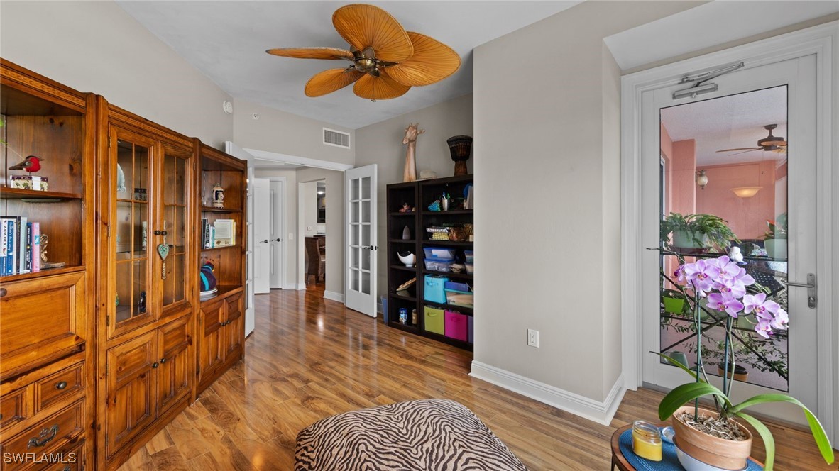 2743 First Street, Unit 1101 Fort Myers, FL 33916 - Photo 31 of 49 a view of an entryway with wooden floor