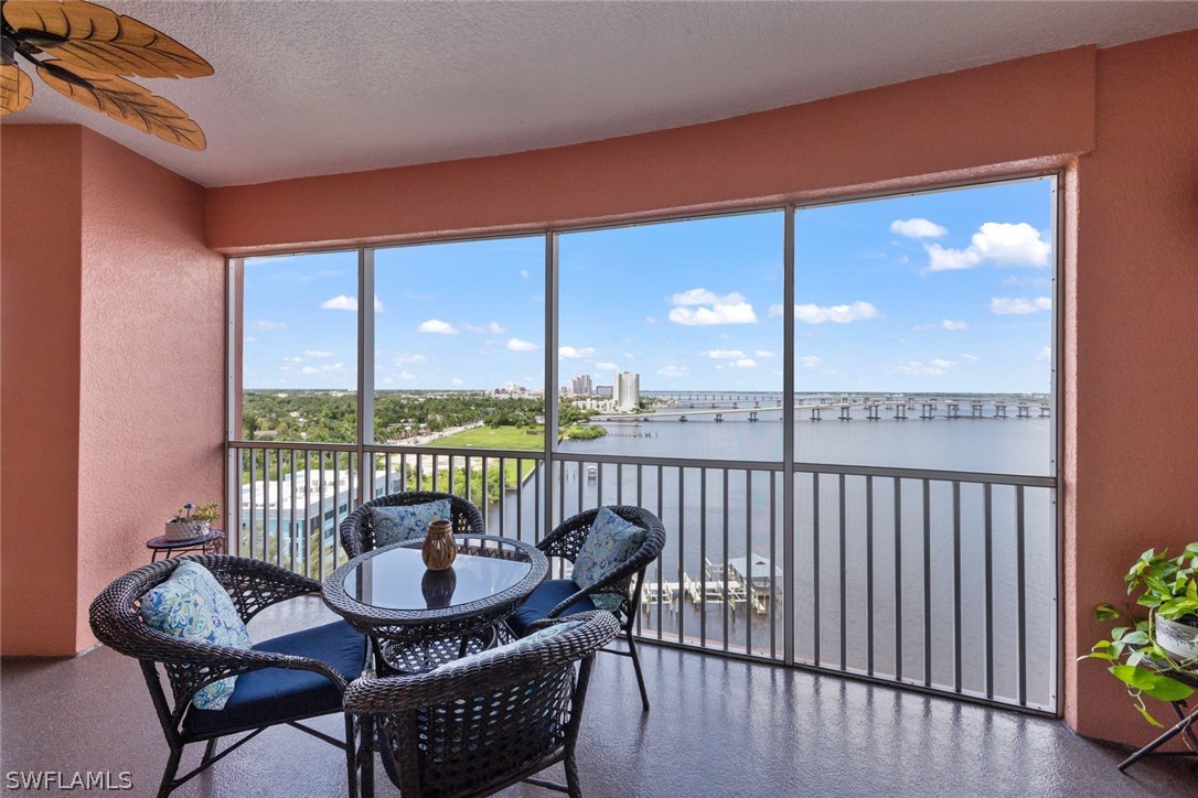 2743 First Street, Unit 1101 Fort Myers, FL 33916 - Photo 36 of 49 a balcony with furniture and garden view