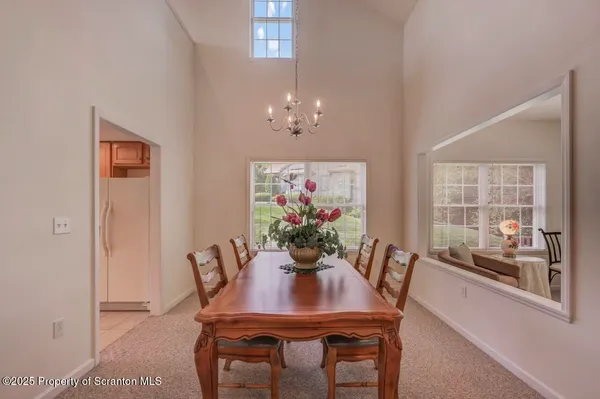 a view of a livingroom with furniture window and outside view