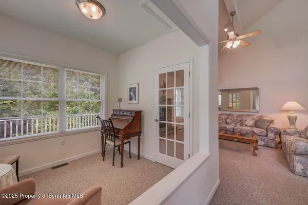 a kitchen with a stove a sink and a refrigerator