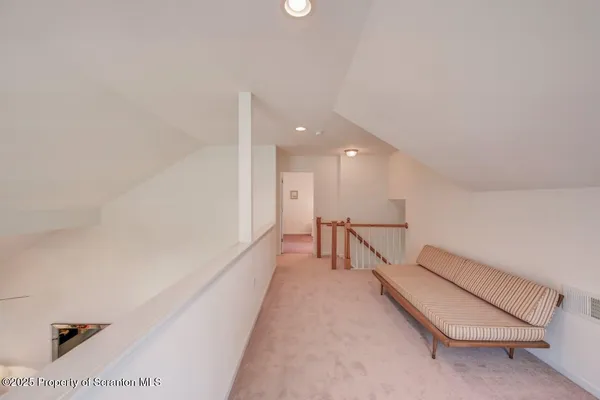 a view of a park with large trees