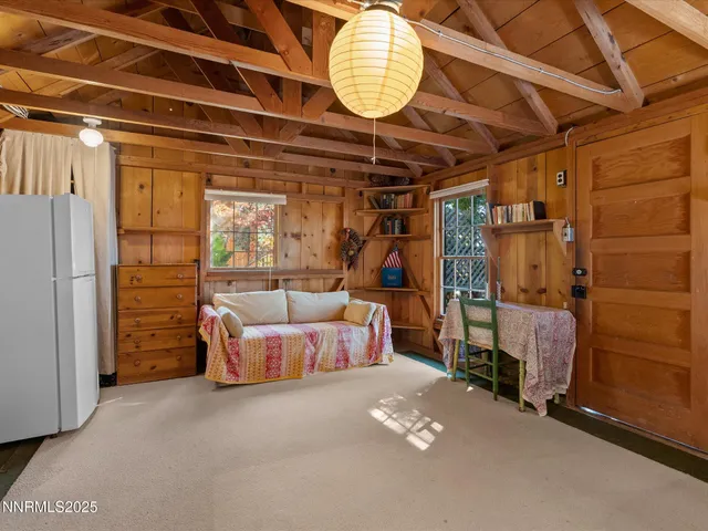 a bathroom with a toilet sink and shower