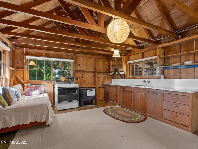 a view of an empty room with a couch