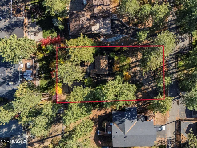 a bedroom with furniture and a wooden floor